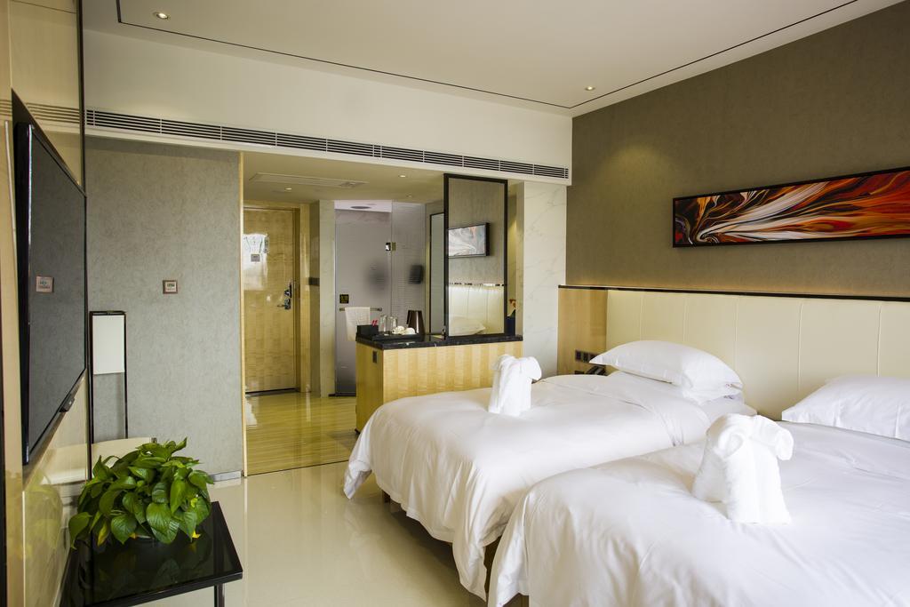 Lori Star Hotel Qionghai Phòng bức ảnh
